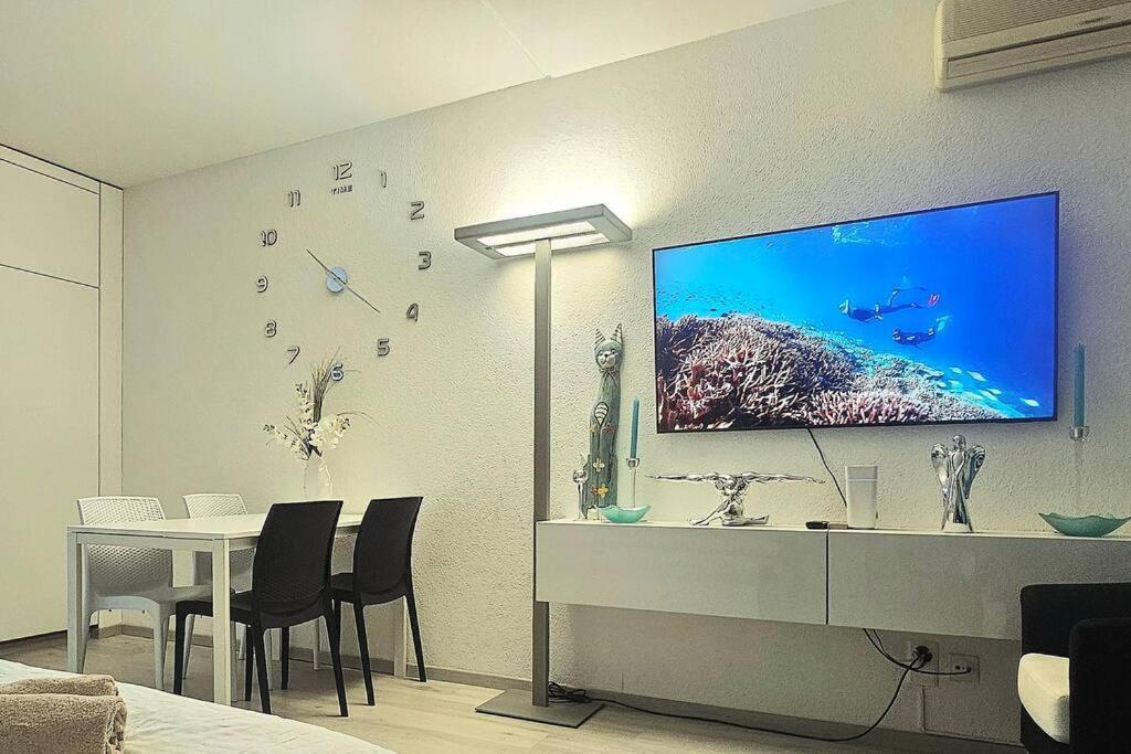 Idyllische Ferienwohnung In Bissone Buitenkant foto