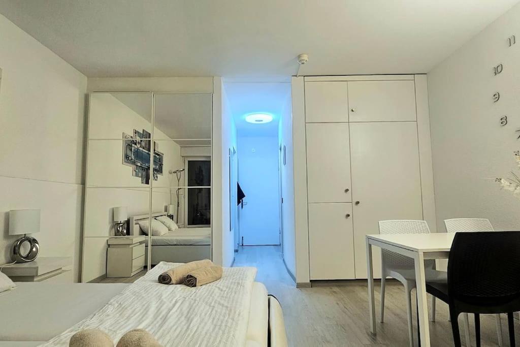 Idyllische Ferienwohnung In Bissone Buitenkant foto
